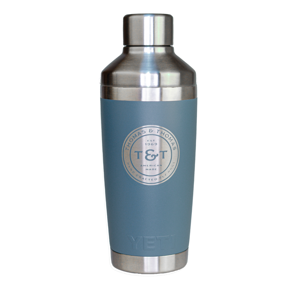 Thomas & Thomas Rods & Accessories - Nordic Blue 20oz YETI Ranbler Rumbler with Stainless Steel Cocktail Shaker Lid. Silver Engraved T&T Logo Badge in the center.