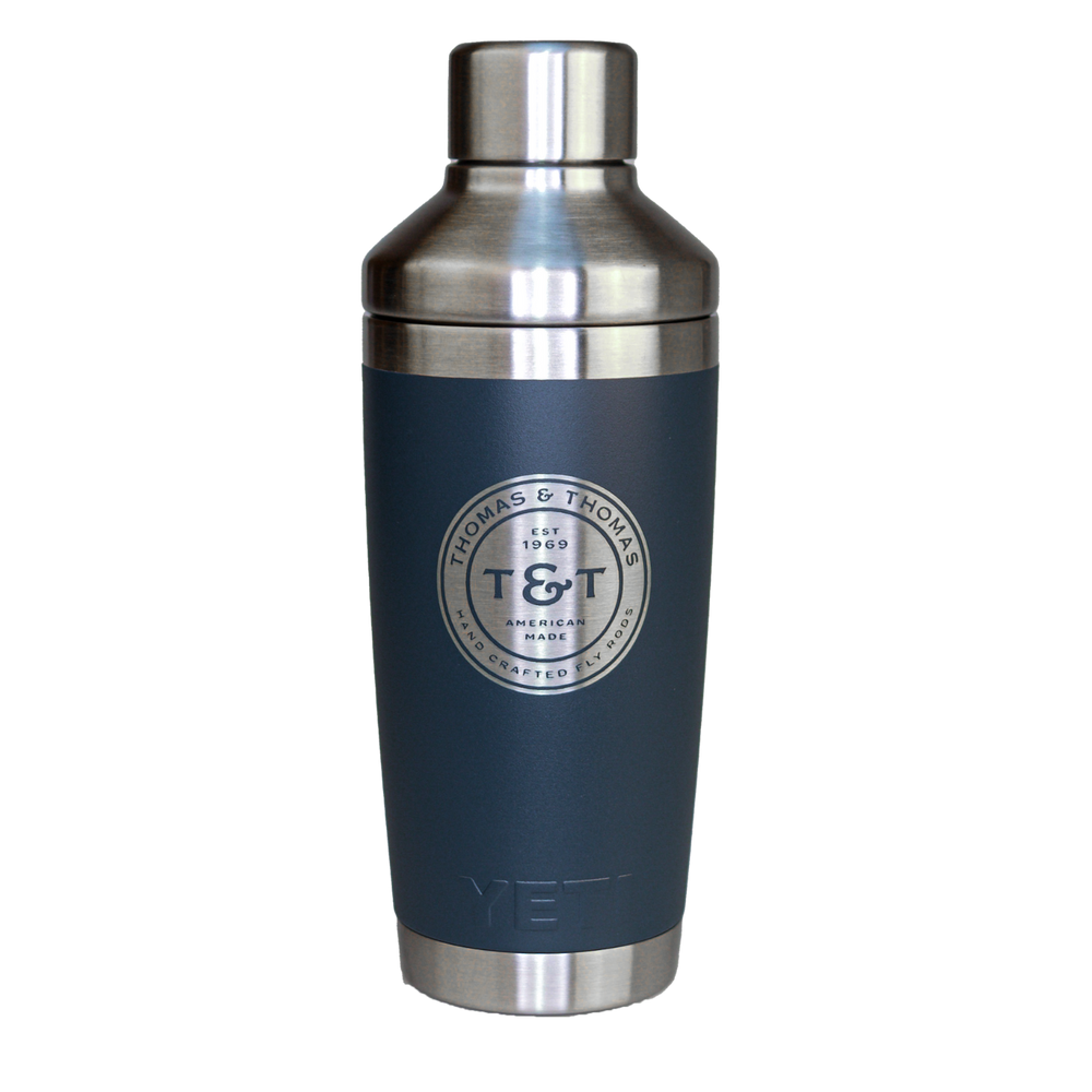 Thomas & Thomas Rods & Accessories - Navy 20oz YETI Ranbler Rumbler with Stainless Steel Cocktail Shaker Lid. Silver Engraved T&T Logo Badge in the center.
