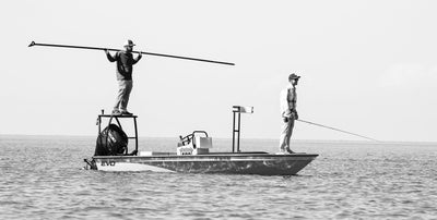 Fly fisherman on a boat in the Florida Keys, using a Thomas & Thomas saltwater fly rod