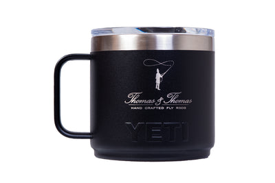 Thomas & Thomas Rods & Accessories - Black Yeti mug with silver rim and handle on a white background